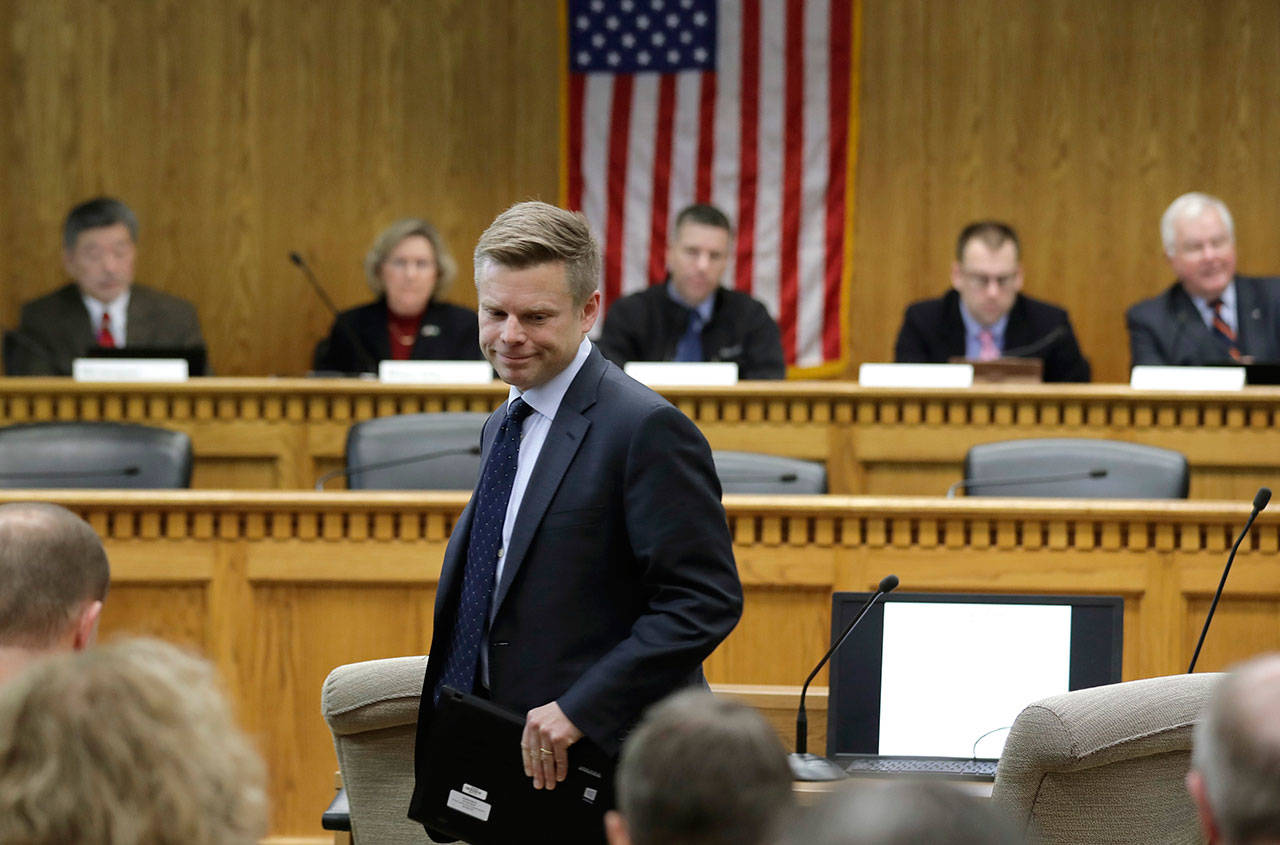 State Sen. Jamie Pedersen D-Seattle, stands up after testifying Wednesday during a public hearing of the Senate State Government, Tribal Relations. (Ted S. Warren/The Associated Press)