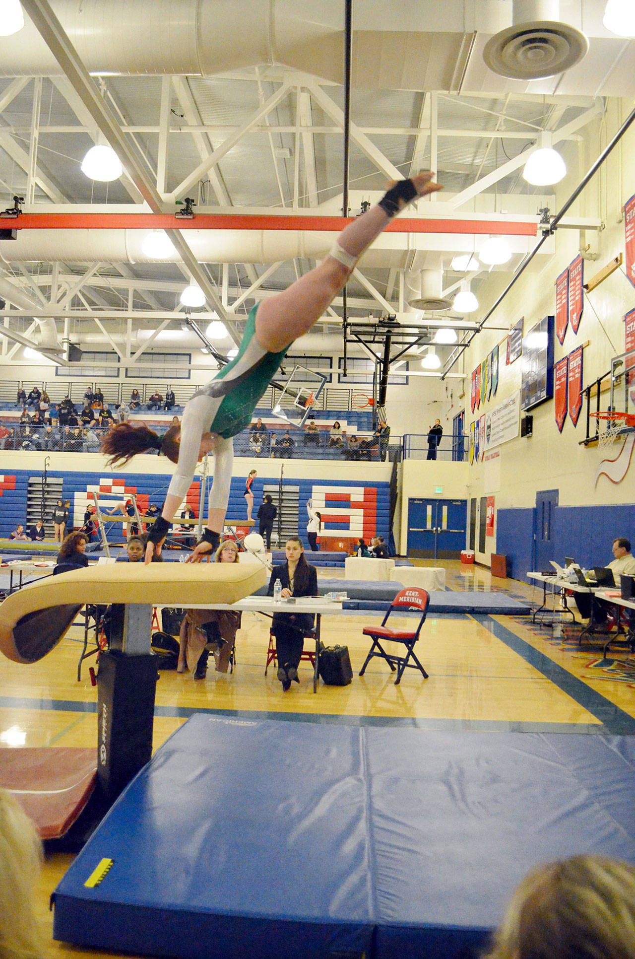 Jackie Mangano Port Angeles’ Aiesha LaTourette competes on the vault during the Class 2A/3A West Central District Gymnastics meet at Kent-Meridian High School. LaTourette will compete at the state gymnastics meet at Sammamish High School on Thursday and Friday.