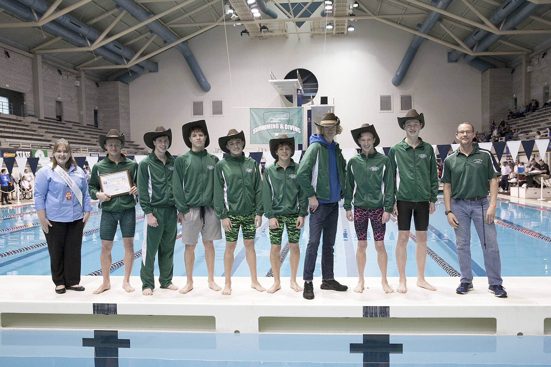 Patty Reifenstahl                                The Port Angeles boys swim and dive team won the WIAA’s Class 2A Winter Academic State Championship with a 3.644 grade point average. Team members from left, Cameron Butler, Andrew Methner, Josh Krzysiak, Alex Hertzog, Max Larsen, Josh Gavin, Taylor Martin and coach Rich Butler, were honored at the Class 2A State Swim and Dive Championship at the King County Aquatic Center in Federal Way.