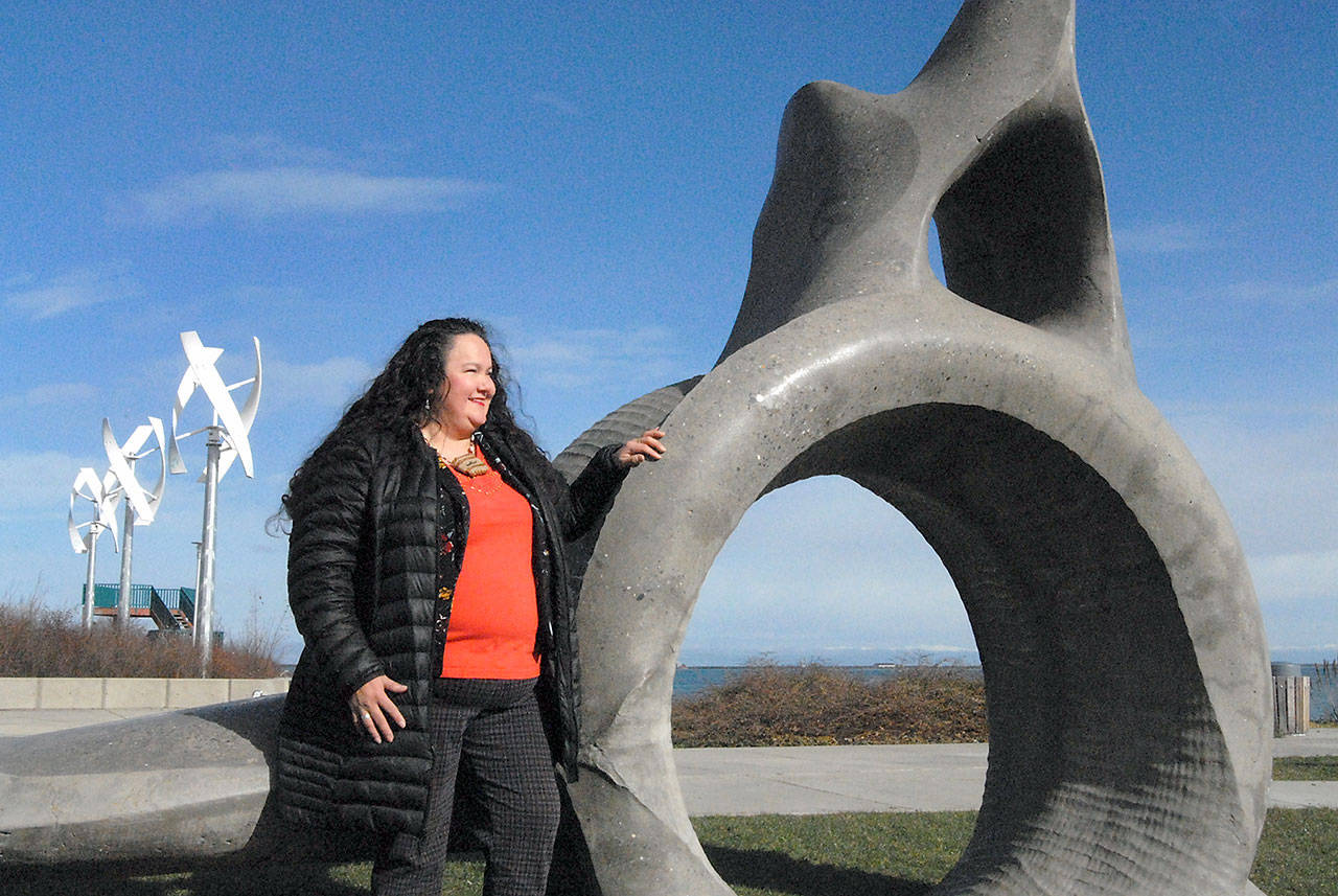 Jessica Elofson, a member of the Lower Elwha Klallam Tribe, with help from her daughter, Gillian, is part of an effort to have the name of West End Park on the Port Angeles waterfront changed to Pebble Beach Park in English and Klallam languages. (Keith Thorpe/Peninsula Daily News)