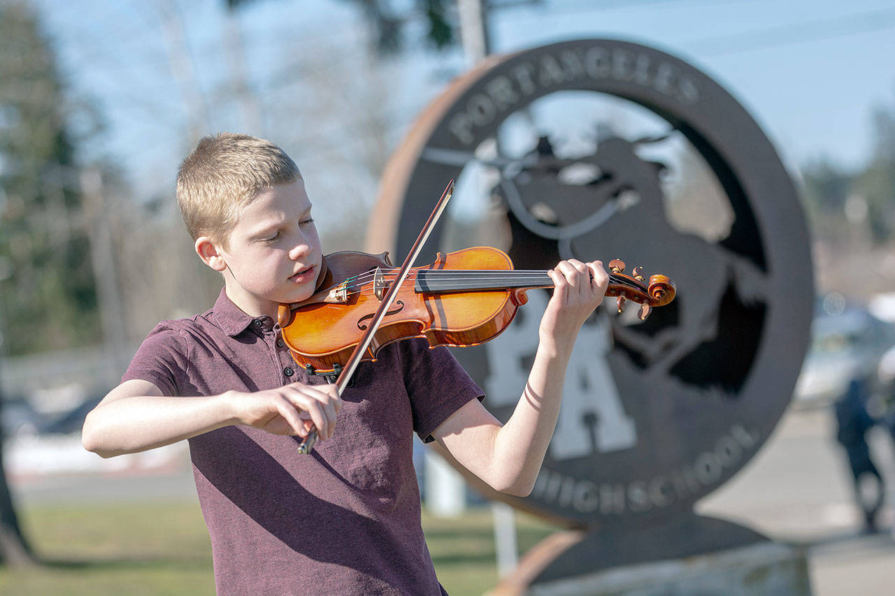 Freshman violinist Adam Weller recently represented Port Angeles High School in the Washington Music Educators Association All-State Orchestra. (Jesse Major/Peninsula Daily News)