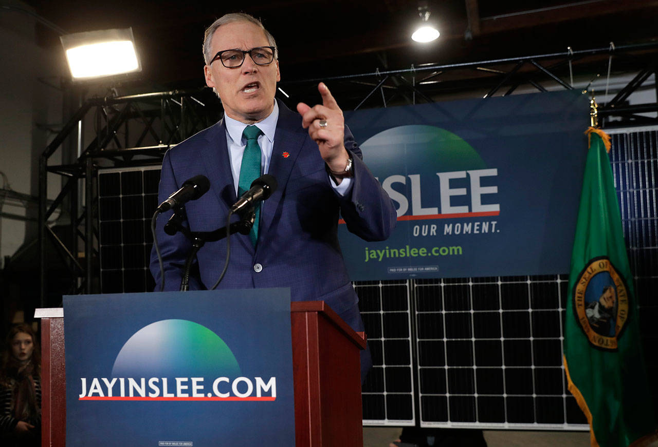 (Ted S. Warren/The Associated Press)                                Gov. Jay Inslee speaks Friday during a campaign event at AR Solar in Seattle.