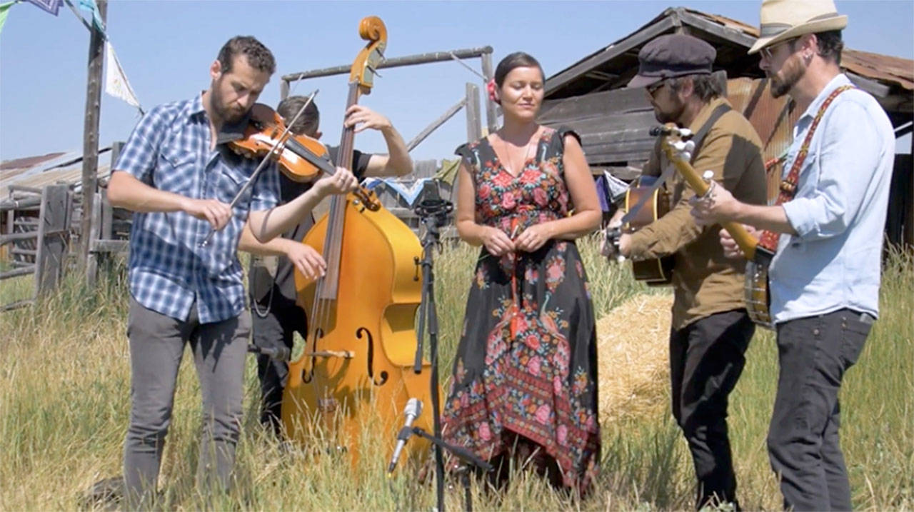 Members of the band I Draw Slow perform in their official video in “Same Old Dress Will Do.”