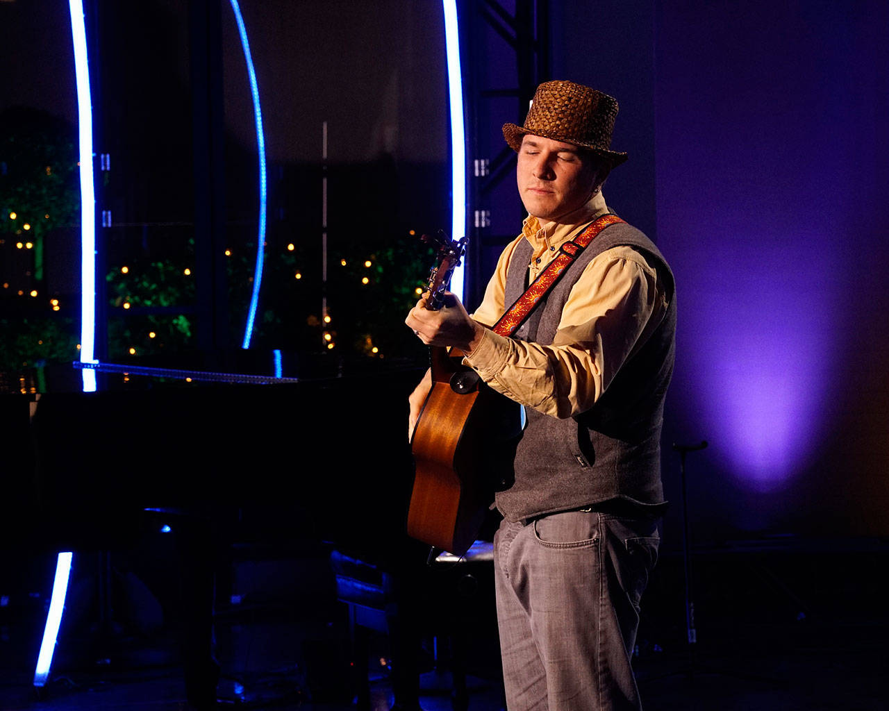 Photo courtesy of AMERICAN IDOL - Coverage. (ABC/Kelsey McNeal) Kalan Wolfe, a 2008 Sequim graduate, performs on “American Idol” before judges leading him to advance to “Hollywood Week.” The show airs in Western Washington at 8 p.m. Sundays and Mondays on KOMO-4.