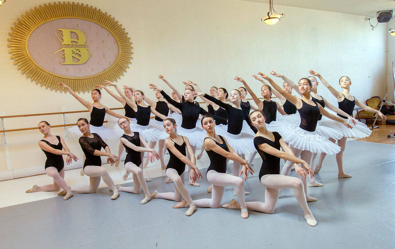 The Ballet Workshop’s students pause during a rehearsal for “Swan Lake.” They will perform in Port Angeles this Saturday and Sunday. (Bob Spink/RTS Photo)