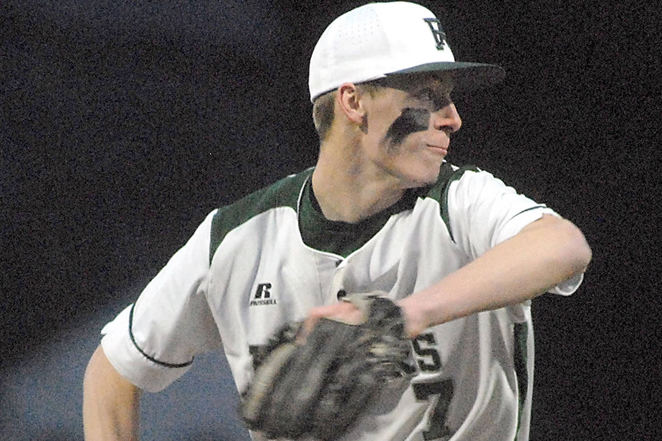 PREP BASEBALL: Woods throws 2-hitter, Flodstrom homers as Port Angeles rolls against rival Sequim