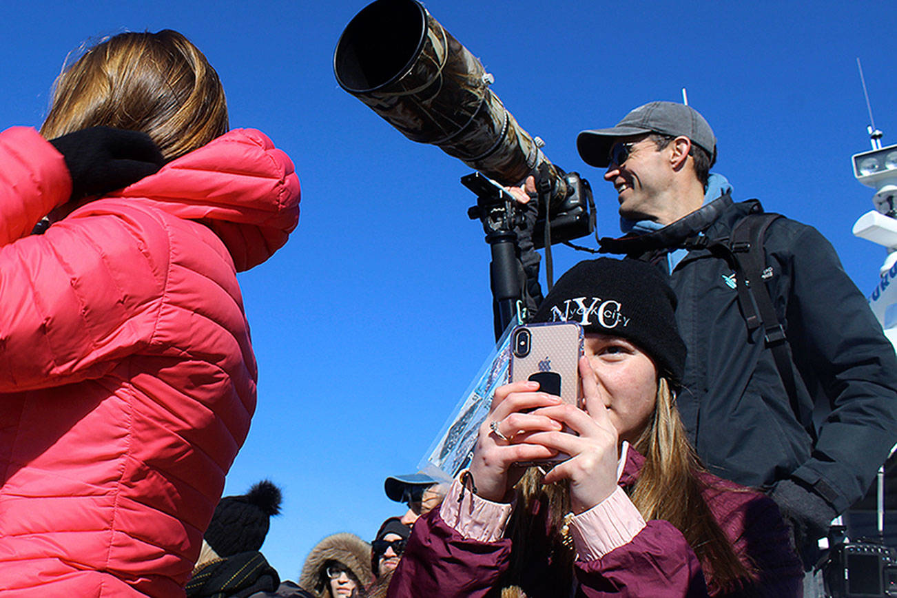 Talk softly, lug a big lens: Naturalist focuses on whales for Puget Sound Express tours