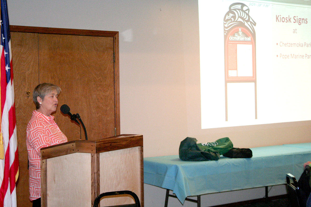 Celeste Dybeck describes the signs that will be posted along different points of interest along the Chetzemoka Interpretive Trail in Port Townsend on Monday during the Jefferson County Chamber of Commerce luncheon at the Elks Club. (Brian McLean/Peninsula Daily News)