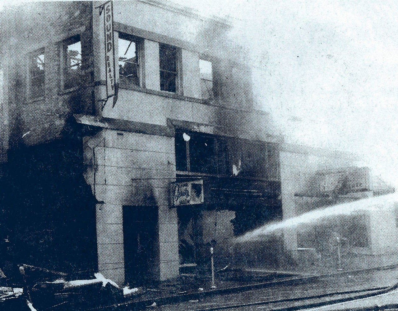 The Aldwell Building, on the corner of First and Laurel streets, caught fire Dec. 12, 1965. (Port Angeles Evening News)