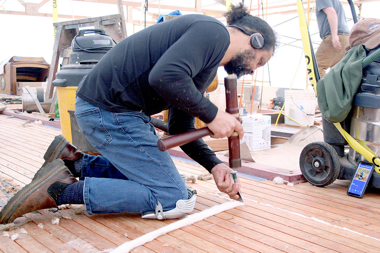 PHOTO: Adding final touches on the Adventuress in Port Townsend