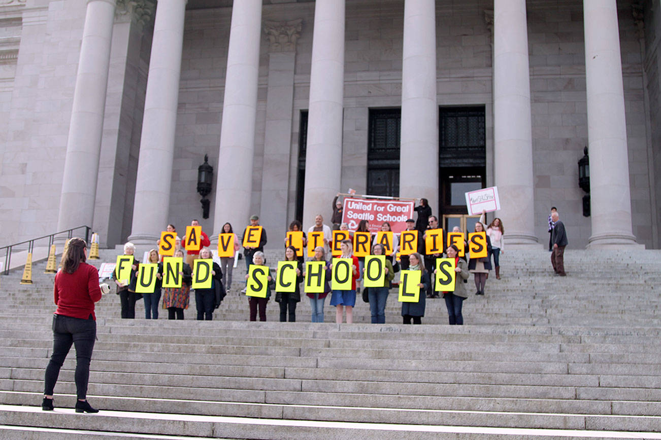 School librarians demonstrate at the Capitol to protest funding cuts