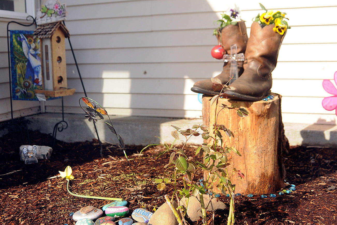 Slain woman’s neighbors still on ‘high alert’ as police continue to investigate