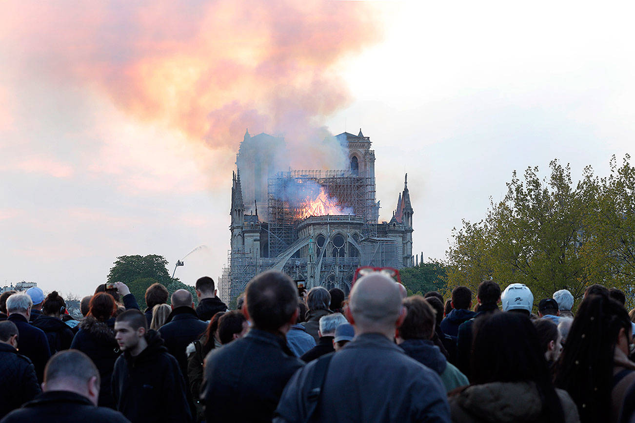 Shock, prayers around the world for burned Notre Dame Cathedral