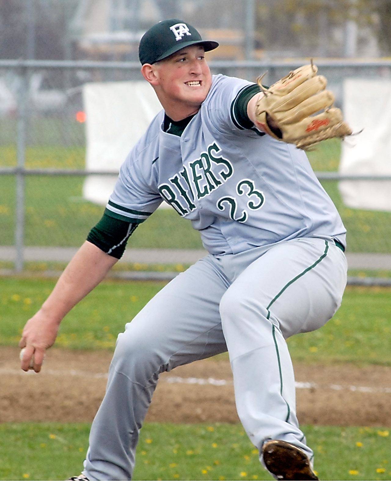 Keith Thorpe/Peninsula Daily News Port Angeles’ Brody Merritt pitches in the first inning against Sequim on Friday at Sequim High School.