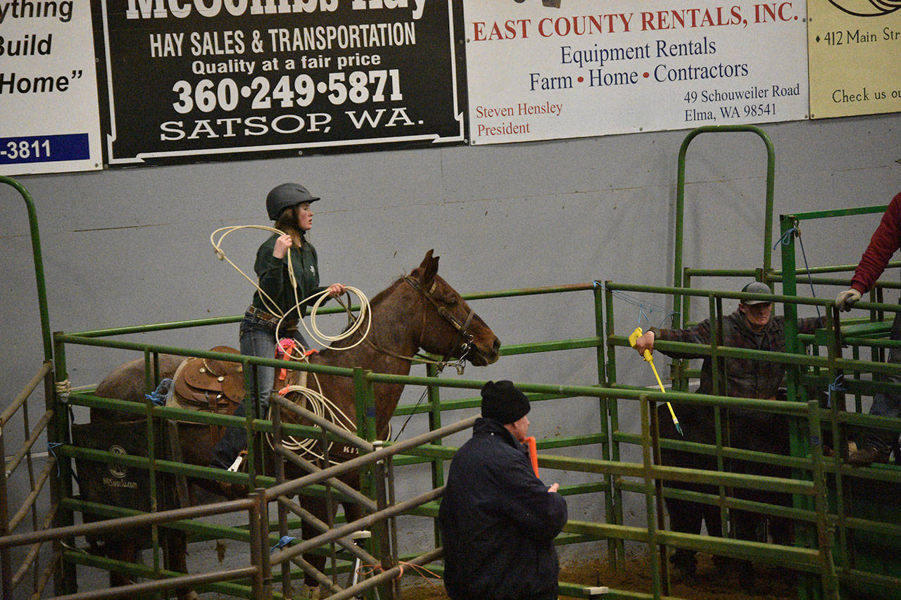 Port Angeles rider Cassi Ann Moore and her roping horse, Roanin, broke the record in breakway roping with a time of 2.59 seconds at Washington State High School Equestrian Team’s District 4 competition held earlier this month in Elma. (Shannon Robbins)