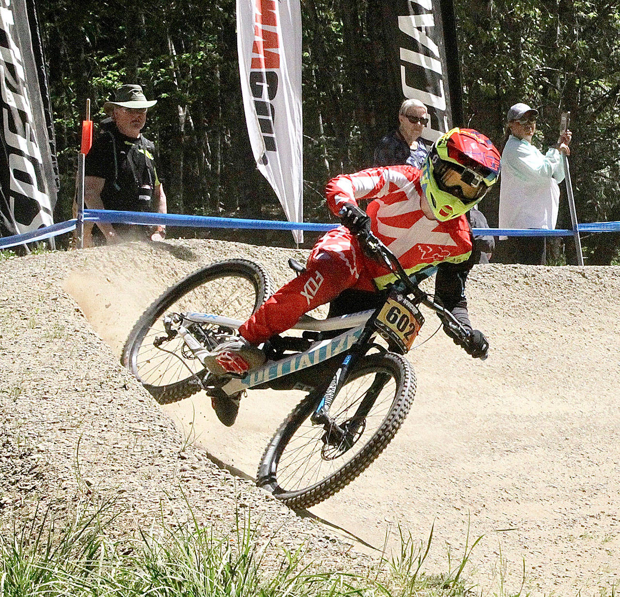 Iain Brixley of Seattle rounds the last corner before the finish line at the Northwest Cup on Dry Hill this Sunday. (Dave Logan/Peninsula Daily News)