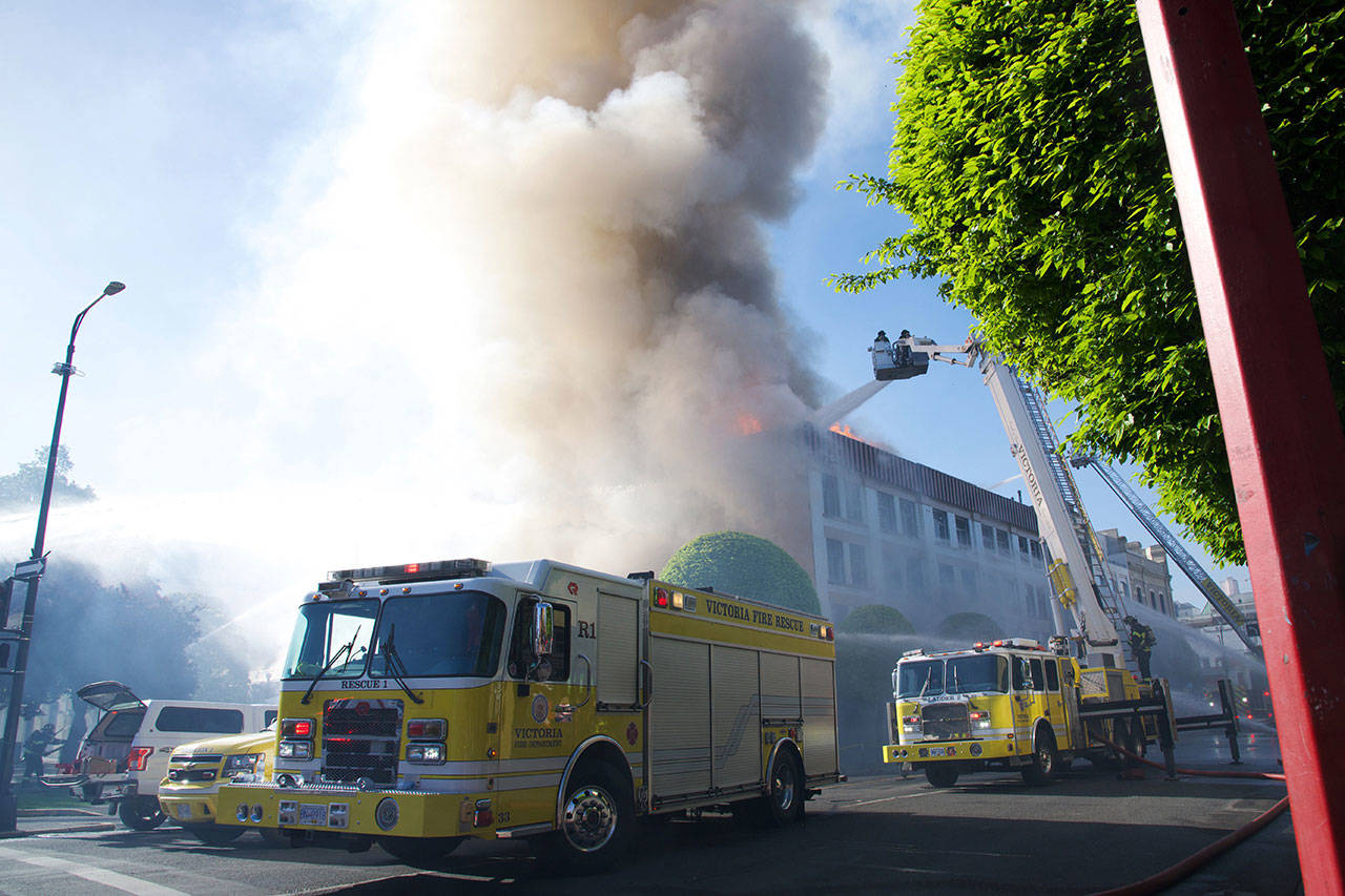 A fire damaged this downtown Victoria building on Monday. (Nicole Crescenzi/Victoria News)