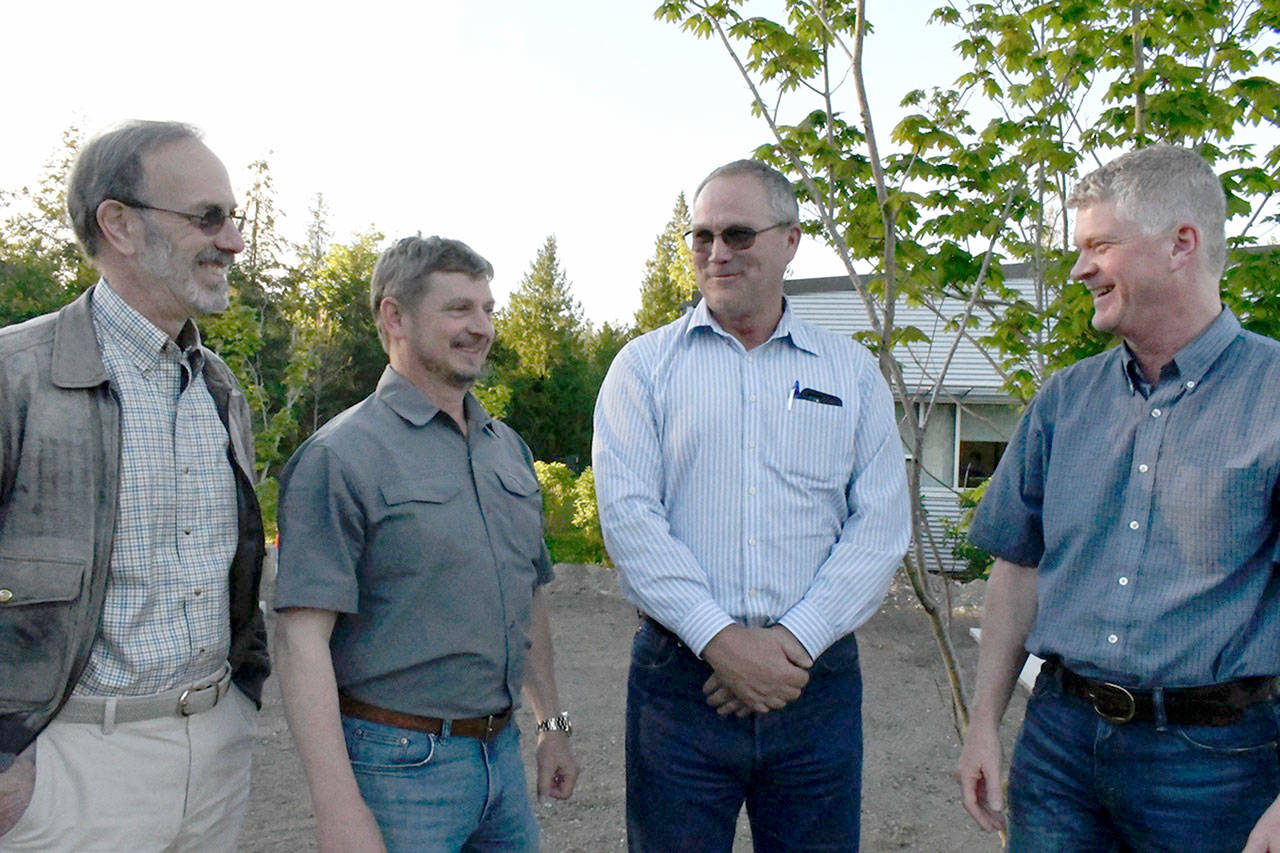 The Jefferson County Public Utility District commissioners voted to make Kevin Streett the utility’s general manager after five months of working in an interim capacity. Streett, third from left, is flanked by commissioners Kenneth Collins, Dan Toepper and Jeff Randall. (Jeannie McMacken/Peninsula Daily News)