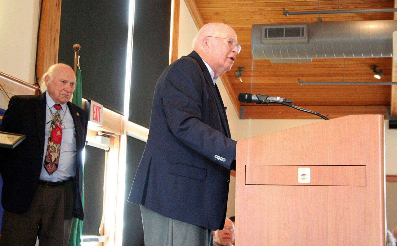 Robert Reasoner was a school superintendent in California for nearly 20 years and promoted STEM education before it was a nationwide objective. Reasoner accepted his Heart of Service award from Chuck Henry, left, for his volunteer work during his 28 years as a Port Ludlow resident. (Brian McLean/Peninsula Daily News)