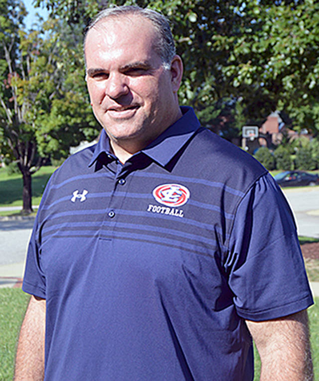 Trevor Highfield, a former University of Washington offensive lineman and junior college coach in North Carolina, has been hired as the new head coach for Forks football.