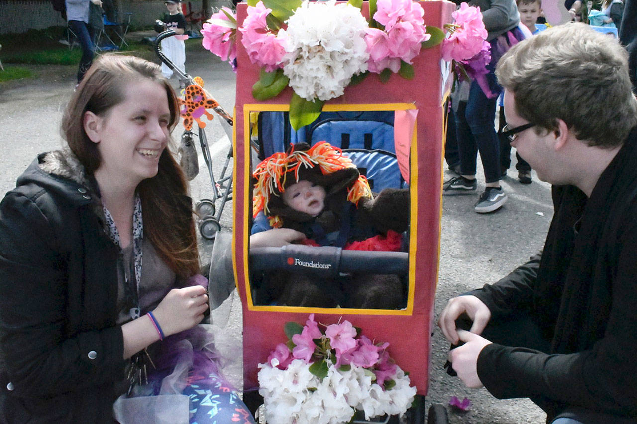 Cedar Brook Early Learning Center teachers and parents Rachel and Aiden Frantz brought their 5-month old daughter, Theresa, to her first Rhody Festival Kiddie Parade dressed as a lioness.