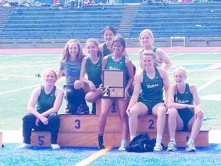 The Port Angeles girls’ track team celebrates winning the WCD III 2A district meet in Bremerton. Sequim also won the boys’ meet, as both schools will send a combined two dozen athletes to the state 2A meet at Mount Tahoma High School on Thursday.