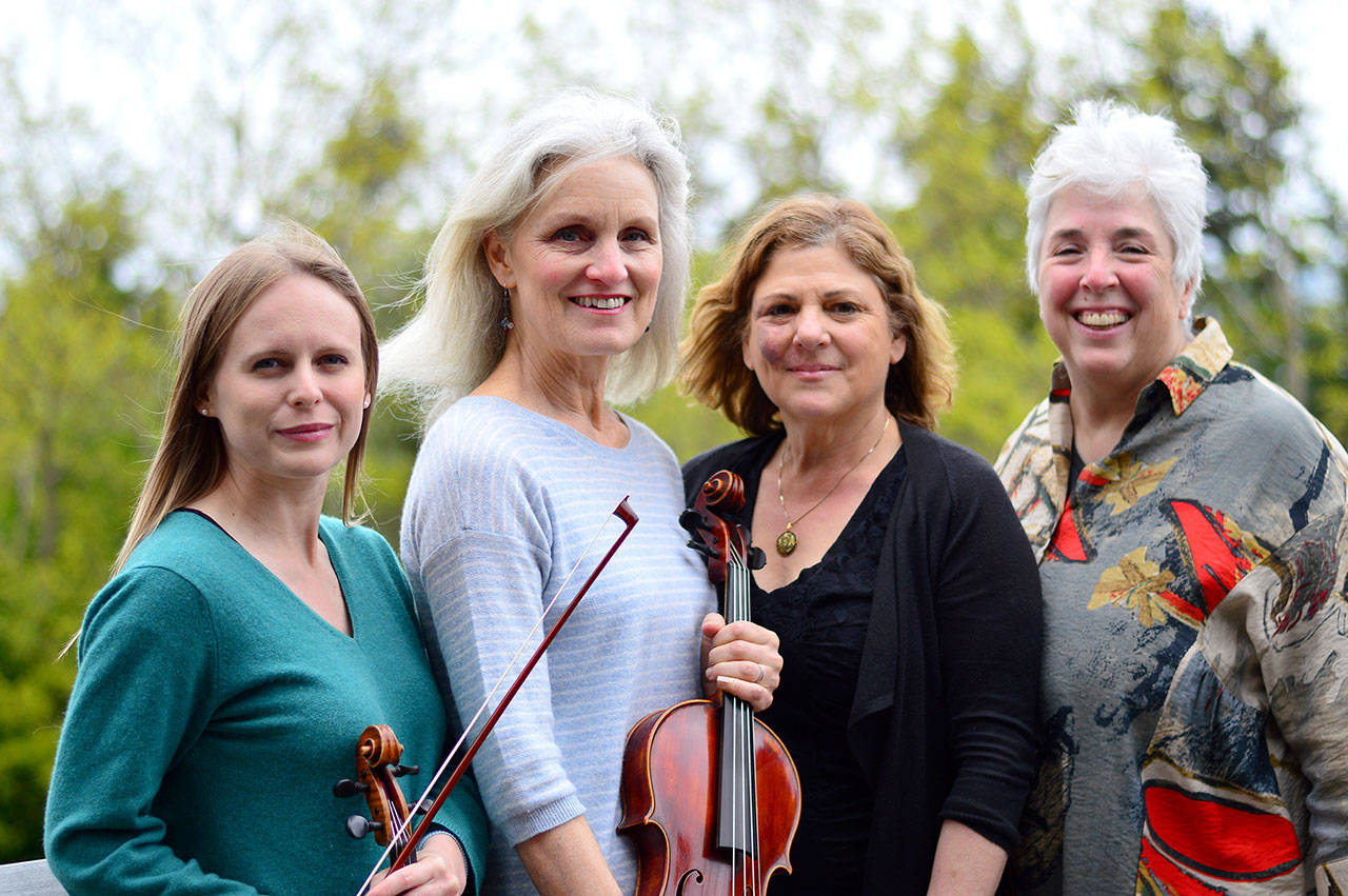 Among the many musicians in Sunday’s benefit concert in Port Townsend are, from left, Marina Rosenquist, Gwen Franz, Lisa Lanza and Maryann Tapiro. (Diane Urbani de la Paz/for Peninsula Daily News)