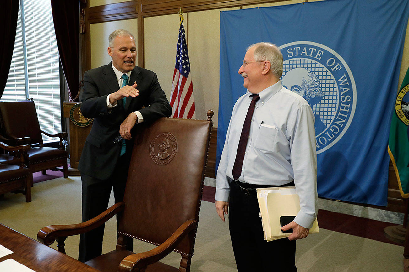 State budgets get signature, warning from governor