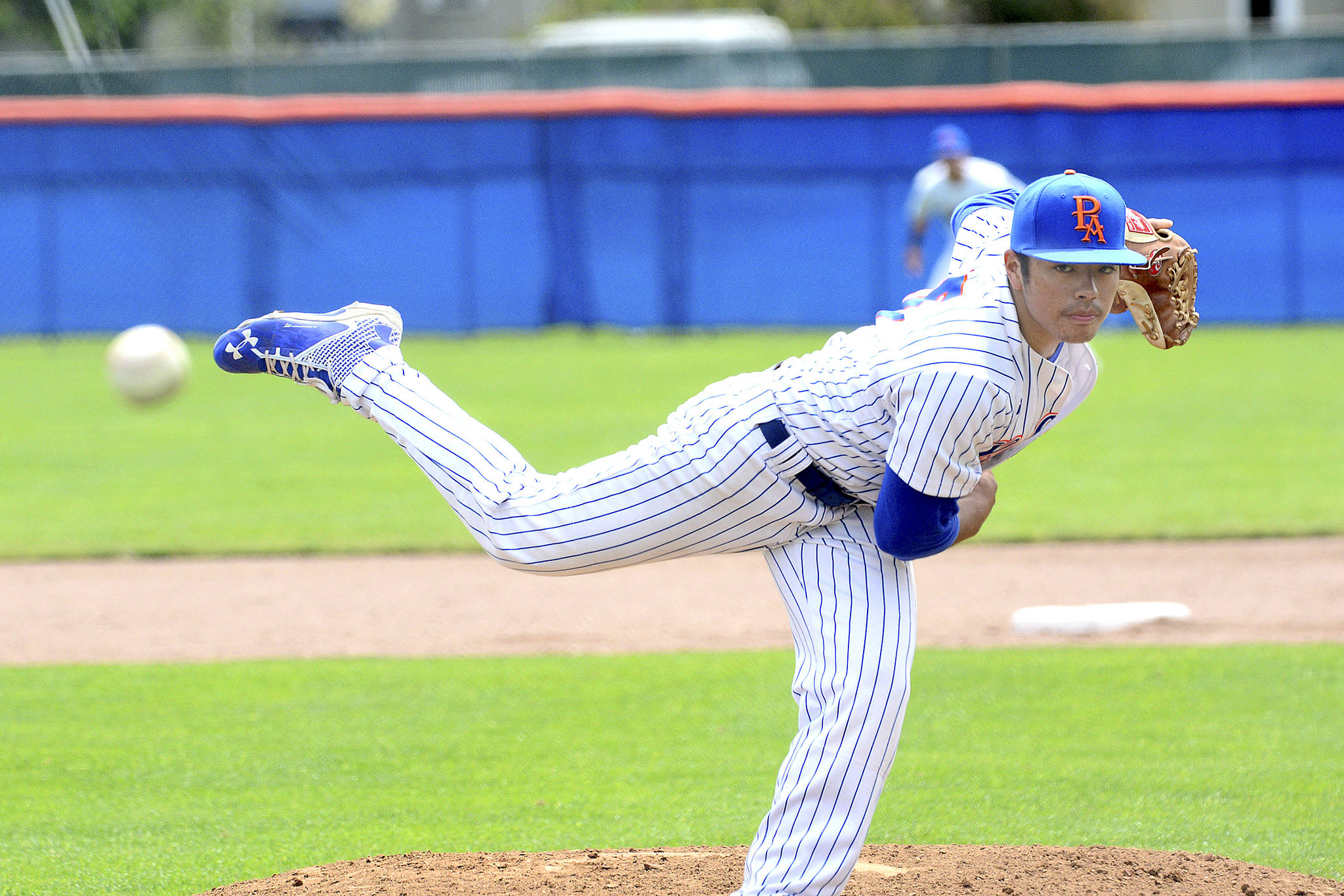 <strong>Jesse Major</strong>/Peninsula Daily News                                 Port Angeles Lefties pitcher Tyler Tan pitches against the Yakima Valley Pippins during the 2018 season. Tan returns to the Lefties for the 2019 season.