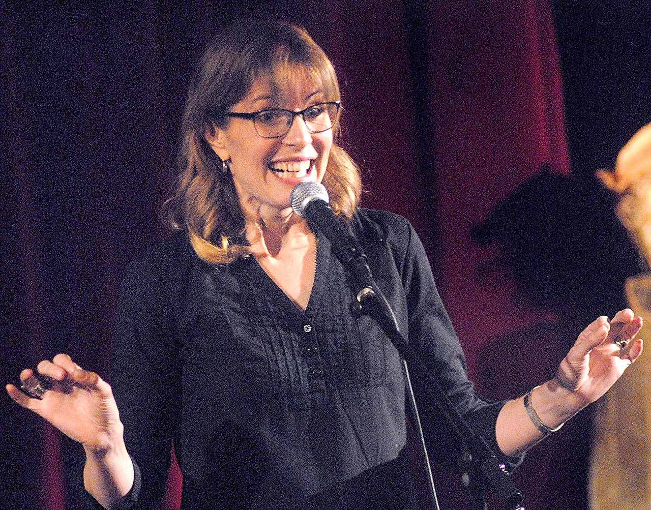 Storyteller Rachel Muller of Ladysmith, B.C., spins a yarn for Port Angeles school children in a performance at the Little Theater at Peninsula College in Port Angeles. (Keith Thorpe/Peninsula Daily News)