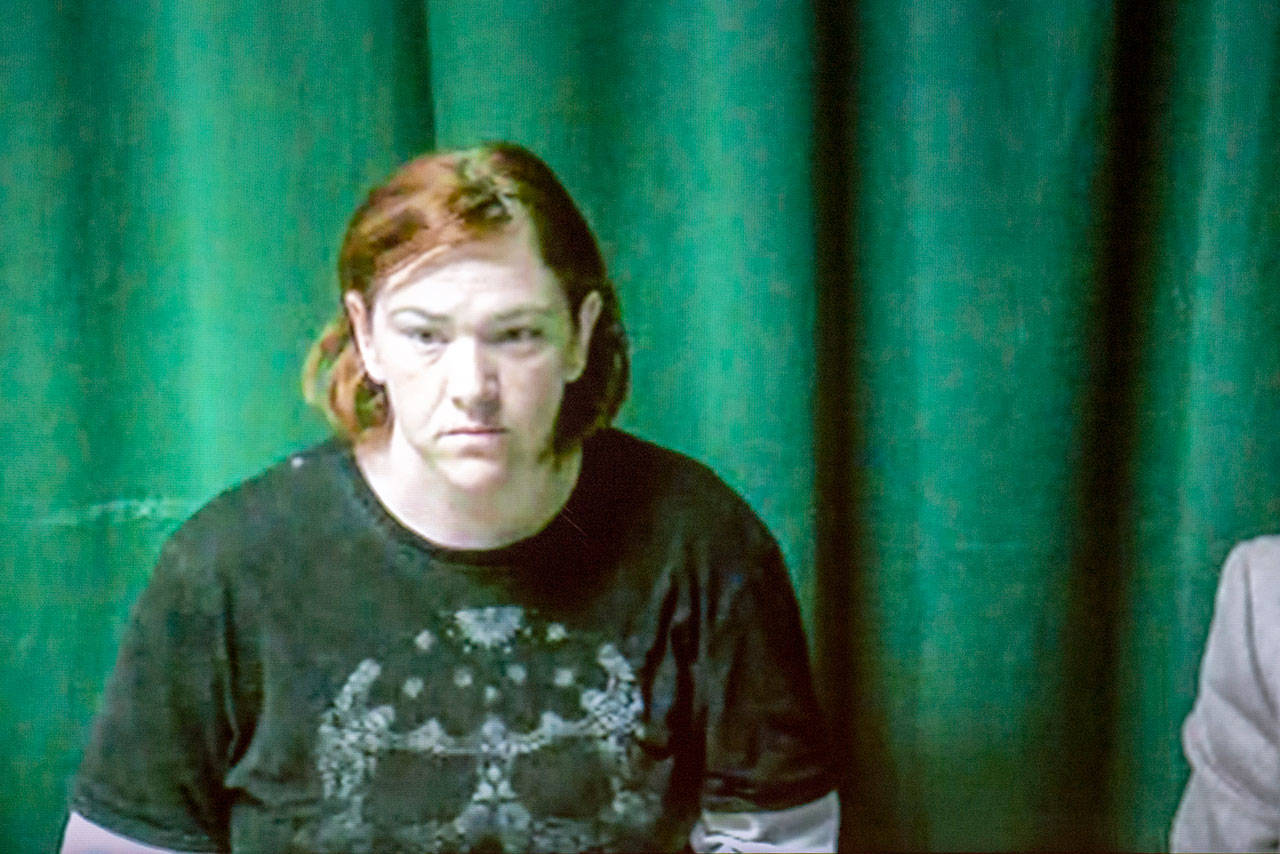 Angela Marie McHenry, who is accused of driving a van on a sidewalk and attempting to run over two women, appears in Clallam County Superior Court on Tuesday. (Jesse Major/Peninsula Daily News)