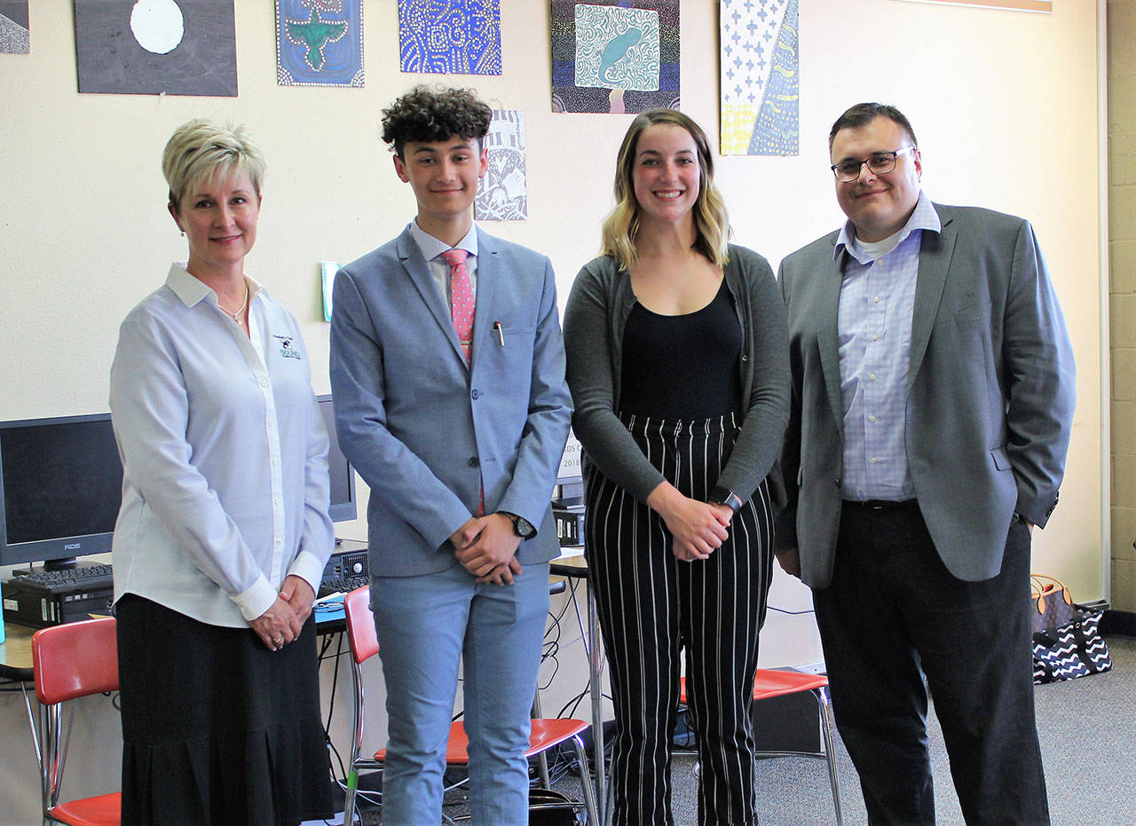 From left, are Laurie Szczepczynski, Sound Community Bank; Mauritz Ahlburg, Business Student of the Year; Aeverie Politika, Marketing Student of the Year; and Jeramey Johnson, Arrow Marine Launch. (Cindy Crumb/Port Angeles School District)