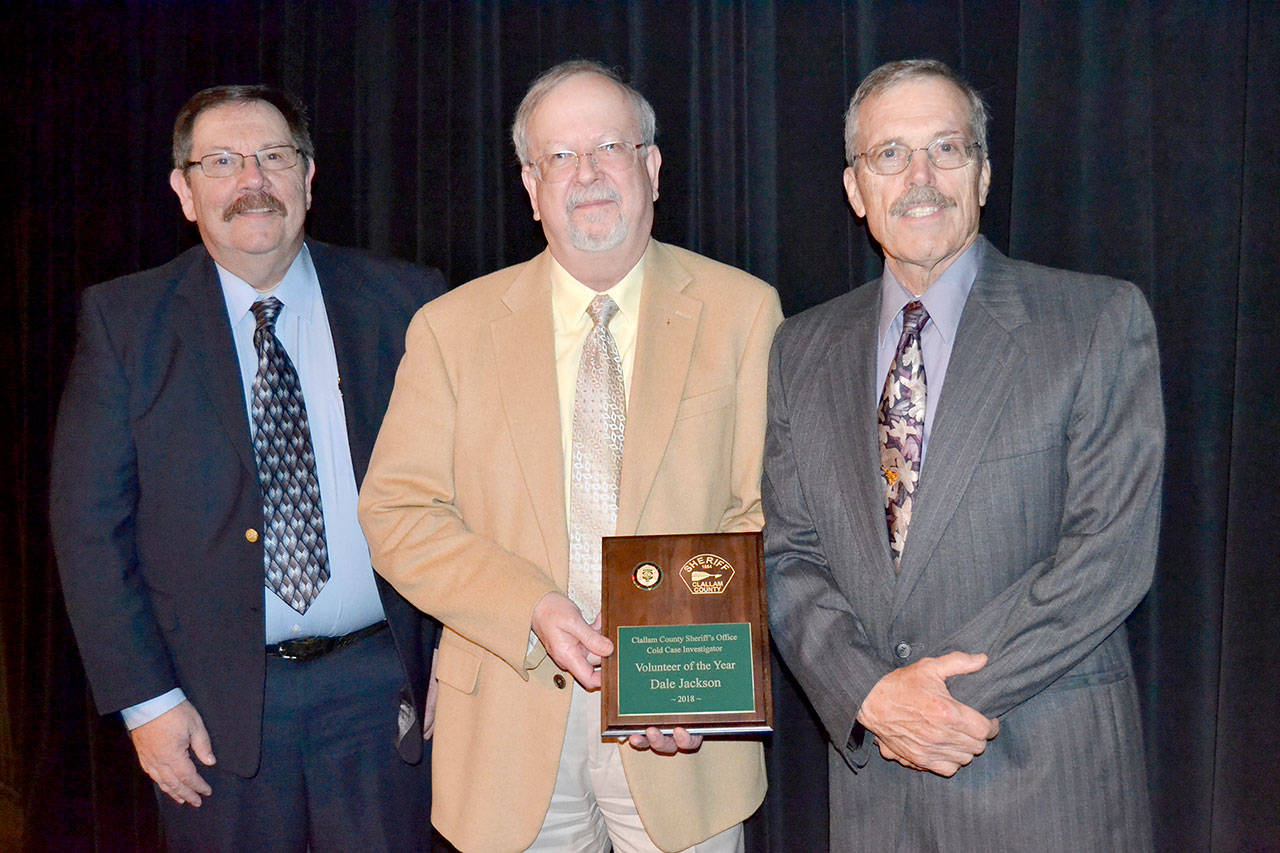 Pictured, from left to right, Undersheriff Ron Cameron, 2018 Volunteer of the Year Dale Jackson and Sheriff Bill Benedict.