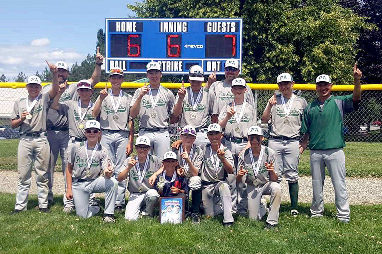 The Port Angeles 12U baseball team won the 50/70 Cal Ripken North Washington State Championship with a 7-6 win over Lynden. Team members and coaches are, back row, from left, Josiah Gooding, coach Jason Gooding, Jordan Shumway, Rylan Politika, Cole Johnson, Kaleb Mullen, coach Sean Worthington, Tate Alton, Colton Romero and coach JR Flores. From left, front are Austin Worthington, Alex Angevine, Leighton Flores (bat boy), Luke Flodstrom, Phoenix Flores and Derek Stadmeyer.