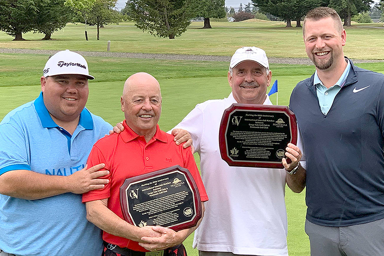 GOLF: Golfers reach across the strait