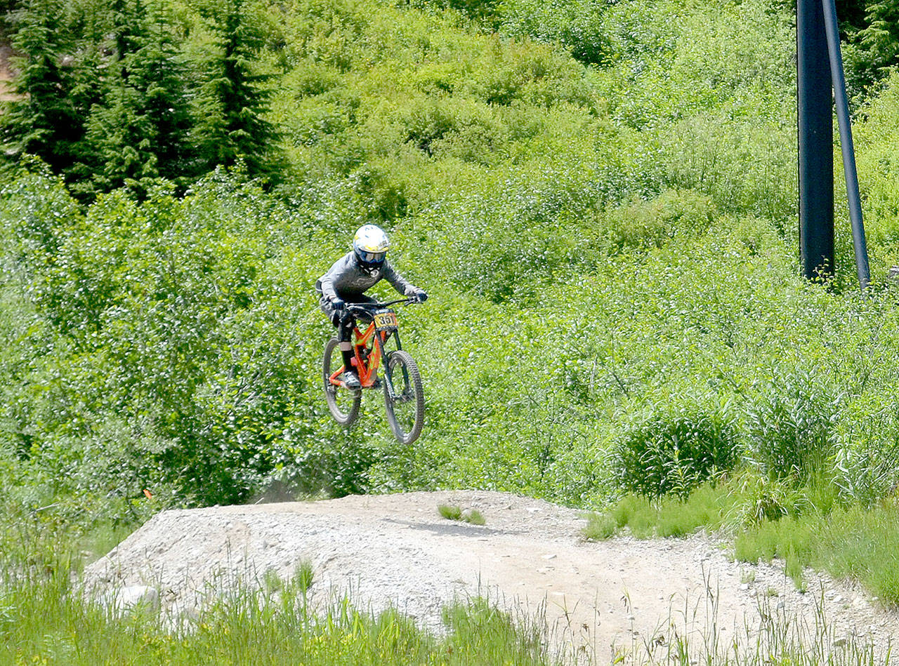 Jackie Mangano Colby Groves of Port Angeles races in the Men’s Cat 2 15-18 division at Stevens Pass on Sunday. A total of 19 Olympic Peninsula riders competed at Stevens Pass.