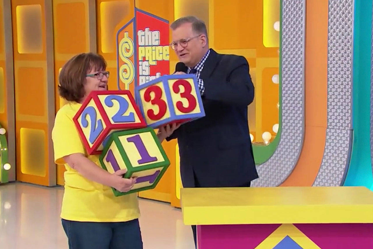 Sequim’s Kathy Conrad attempts to price items according to cost with host Drew Carey on “The Price is Right.” One item she won included a ping pong table, which she donated to the Sequim unit of the Boys & Girls Clubs of the Olympic Peninsula.