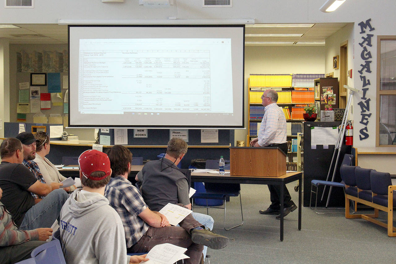 Chimacum Assistant Superintendent Art Clarke explains the 2019-20 budget Wednesday night. (Zach Jablonski/Peninsula Daily News)