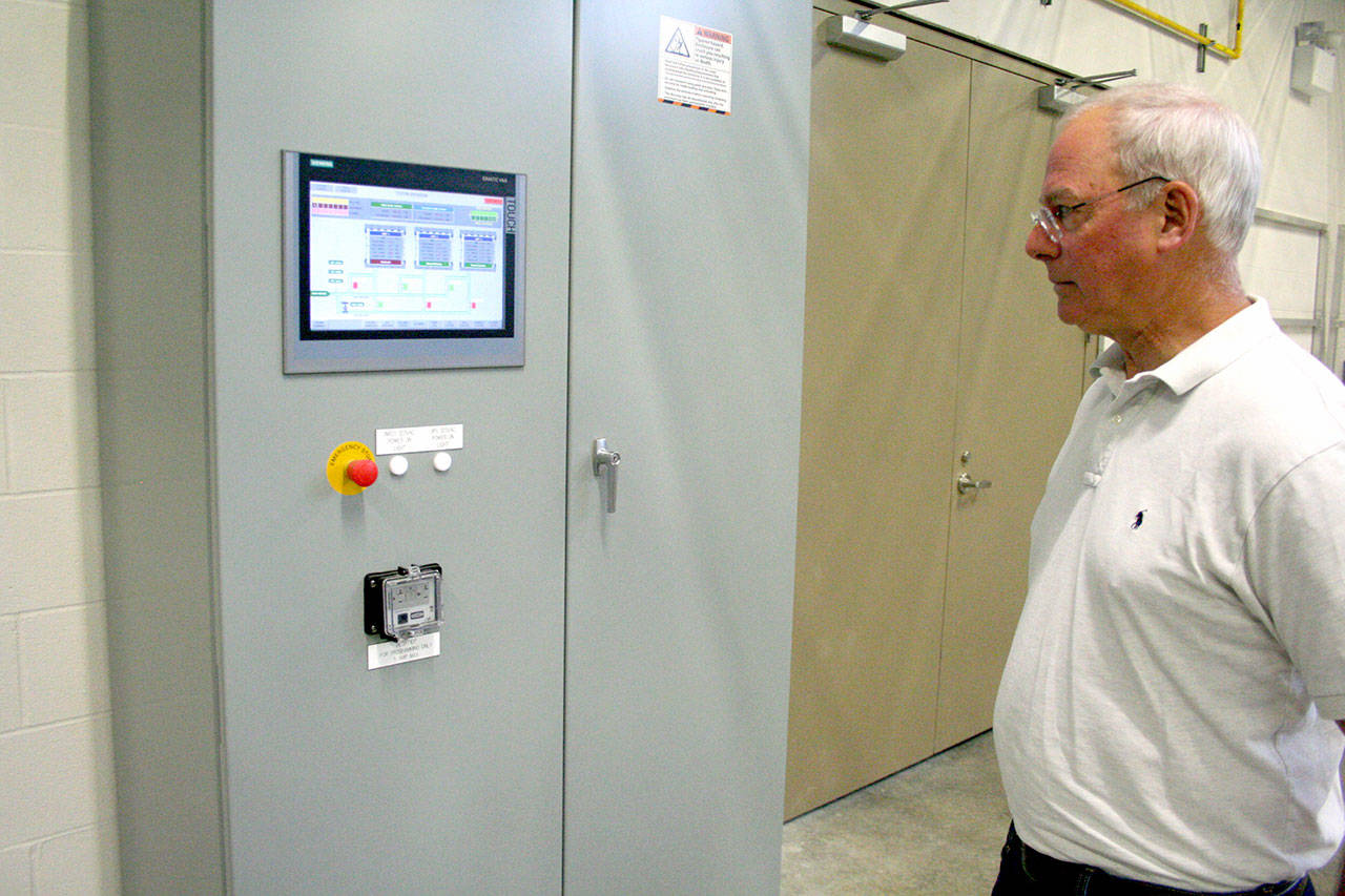 Ian Jablonski, Port Townsend’s operation manager for water resources, describes the automated processes that are programmed by computer to clean and maintain each of the functions at the city’s water treatment facility off 20th Street. (Brian McLean/Peninsula Daily News)