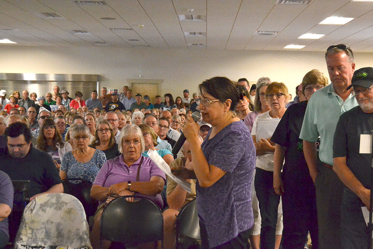 Wendy Goldberg said Monday night many people don’t feel the Medication-Assisted Treatment (MAT) center is an ordinary clinic, and she wanted to know how the city could reclassify it so that it would require a conditional use permit and more oversight from the city’s planning commission. (Matthew Nash/Olympic Peninsula News Group)