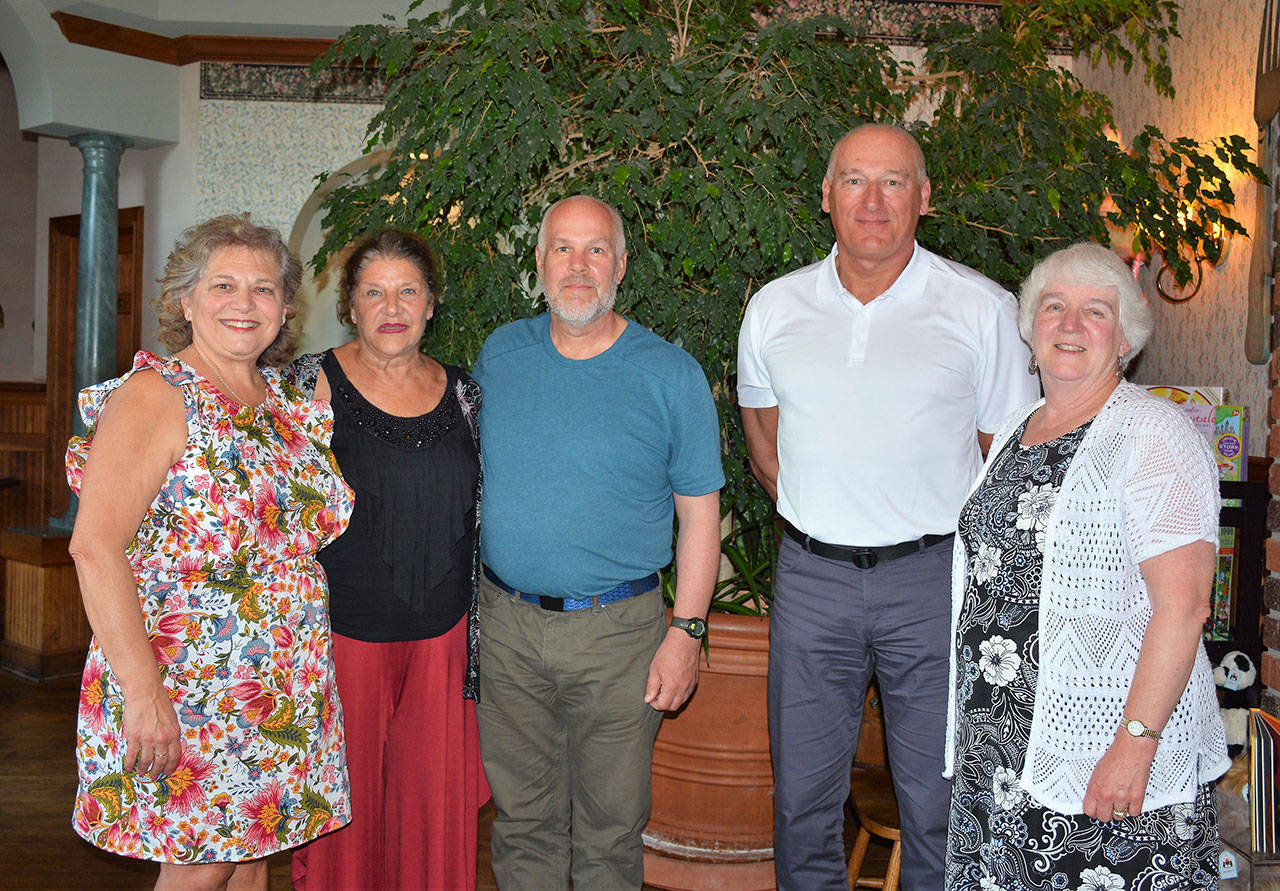 Retiring Port Angeles School District staffers, from left, are Mary Kay McCabe, Cookie Kalfur, Geoffrey Cobb, Stephen Pazan and Kathy Millar at the 23rd annual retiree dinner held June 12 at The Chestnut Cottage. (Patsene Dashiell/Port Angeles School District)