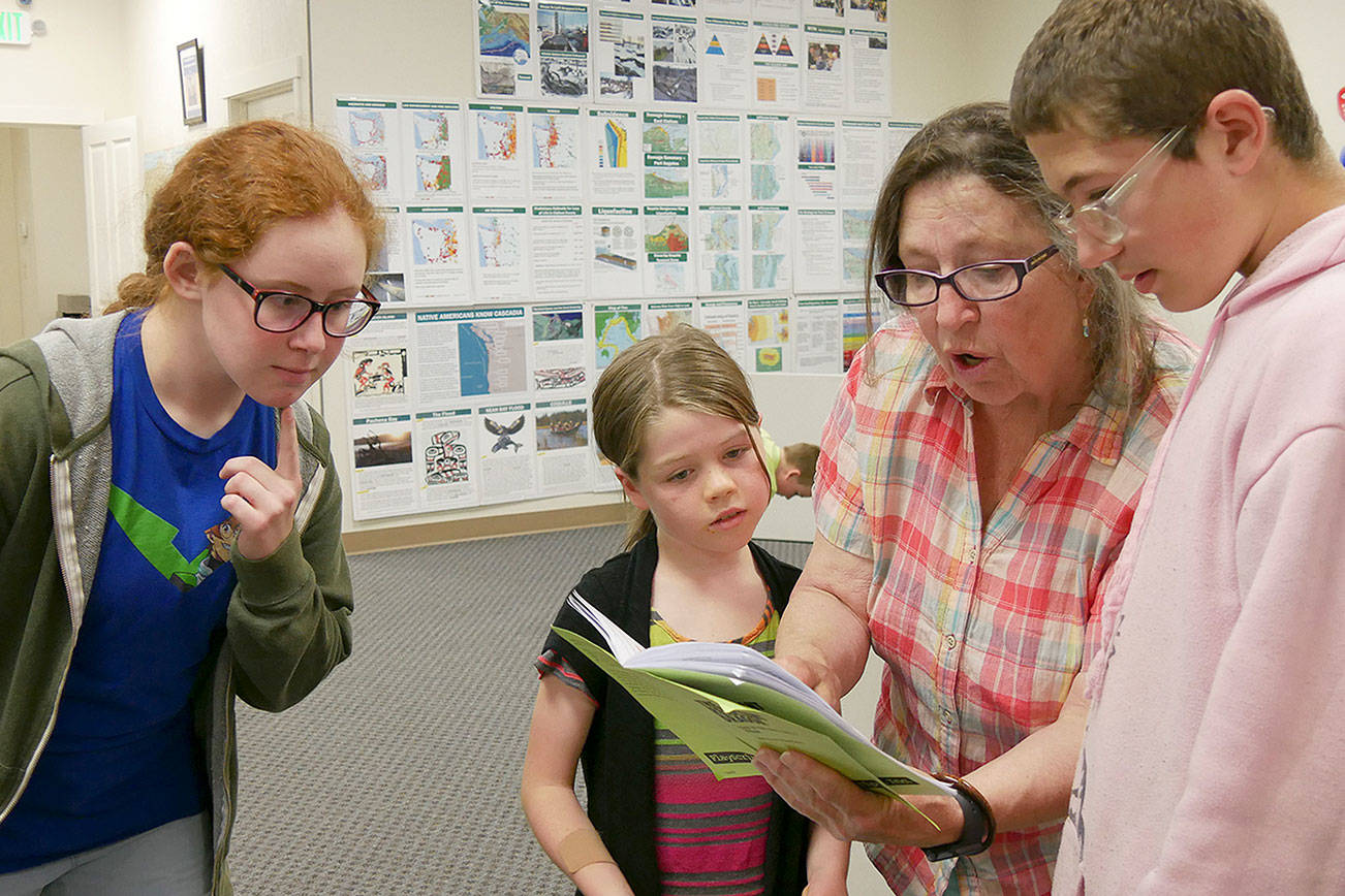 Olympic Theatre Arts’ ‘The Reluctant Dragon’ cast, in rehearsal