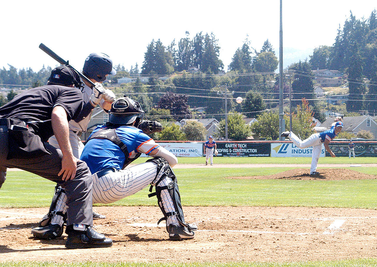 The Lefties’ Tyler Tan pitches against the Portland Pickles in Sunday’s game at Civic Field in Port Angeles. (Pierre LaBossiere/for Peninsula Daily News)