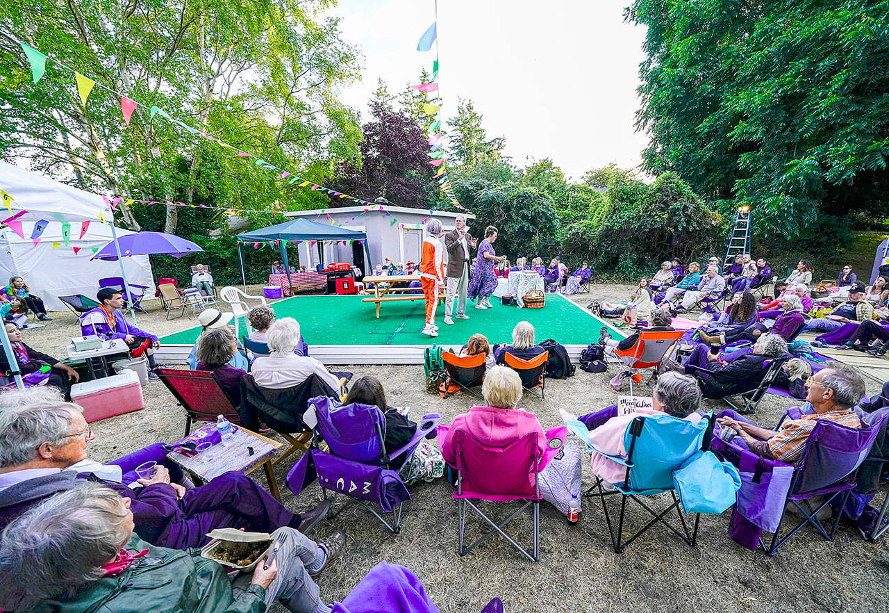 Actors perform a scene from The Merry Wives of Windsor during the annual Shakespeare in the Park produced by Key City Public Theater on Friday. The series, in its 14th year, is performed in Chetzemoka Park on August weekends at 6:00 PM. (Steve Mullensky/for Peninsula Daily News)