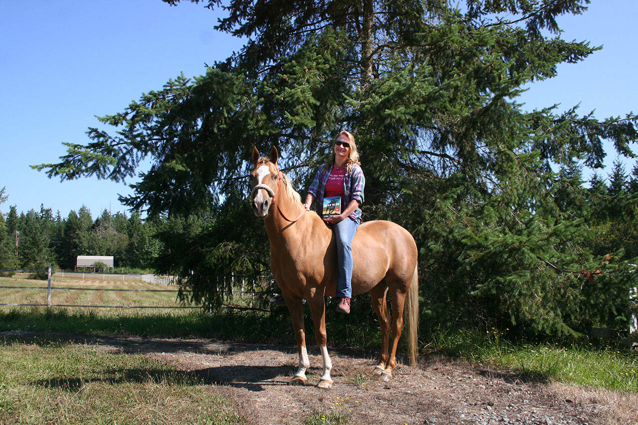 Sequim author and equestrian Lisa Preston, on Savvy, will soon release “Dead Blow,” the second novel in her “A Horseshoer’s Mystery series” that features the strong-minded and passionate female horseshoer-turned sleuth Rainy Dale. (Karen Griffiths/for Peninsula Daily News)