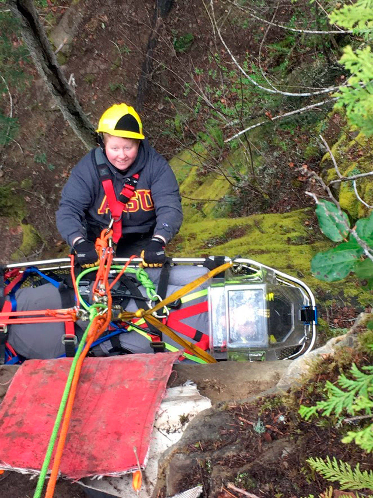Firefighter/EMT Jessica Adams of Clallam 2 Fire Rescue conducts rope rescue training.