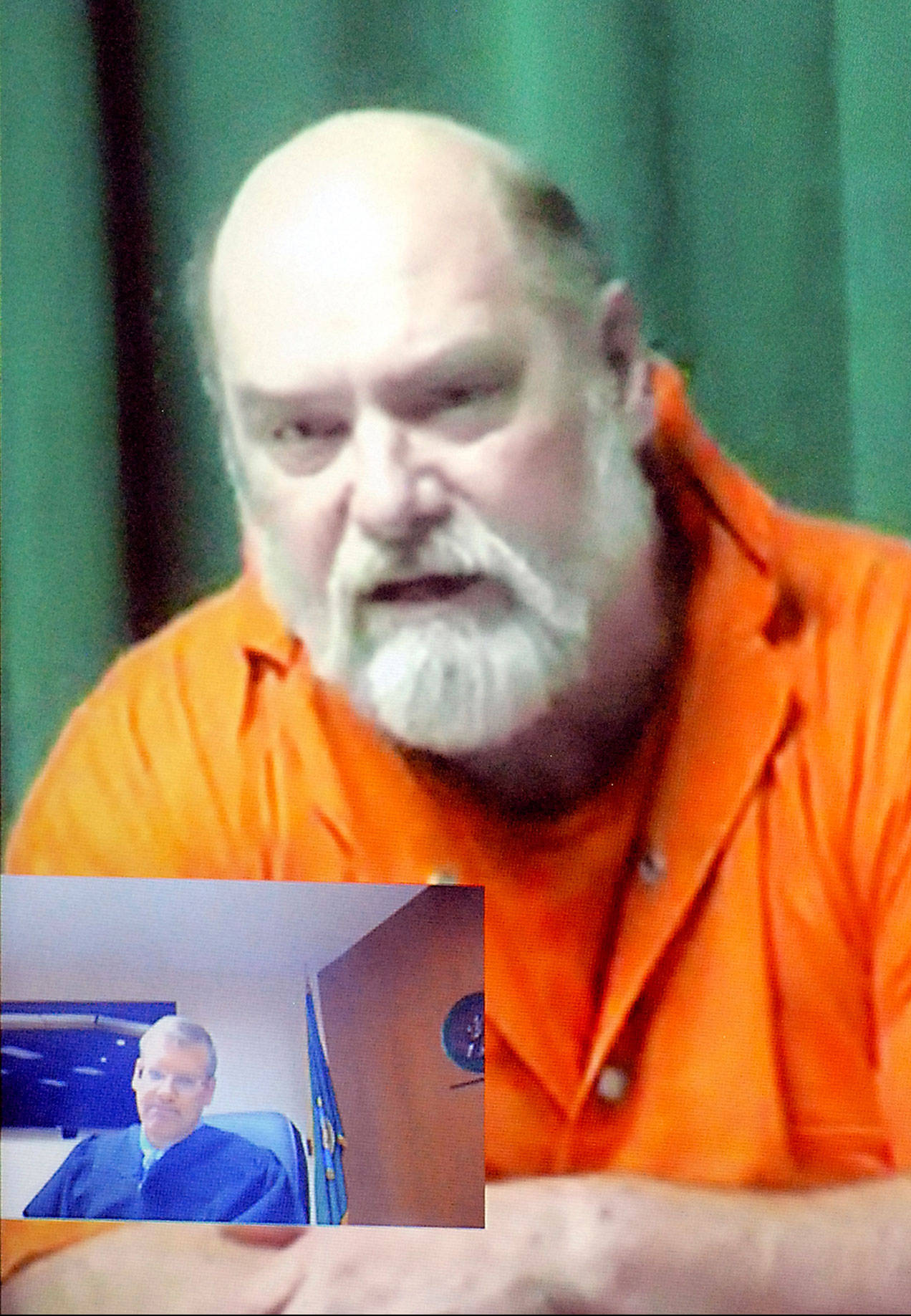 Kenneth Francis Simmons appears by video link in Clallam County Superior Court in Port Angeles as Judge Brent Basden, shown in inset, informs him that prosecutors declined on Wednesday to press local charges on alleged drug and weapons violations. (Keith Thorpe/Peninsula Daily News)