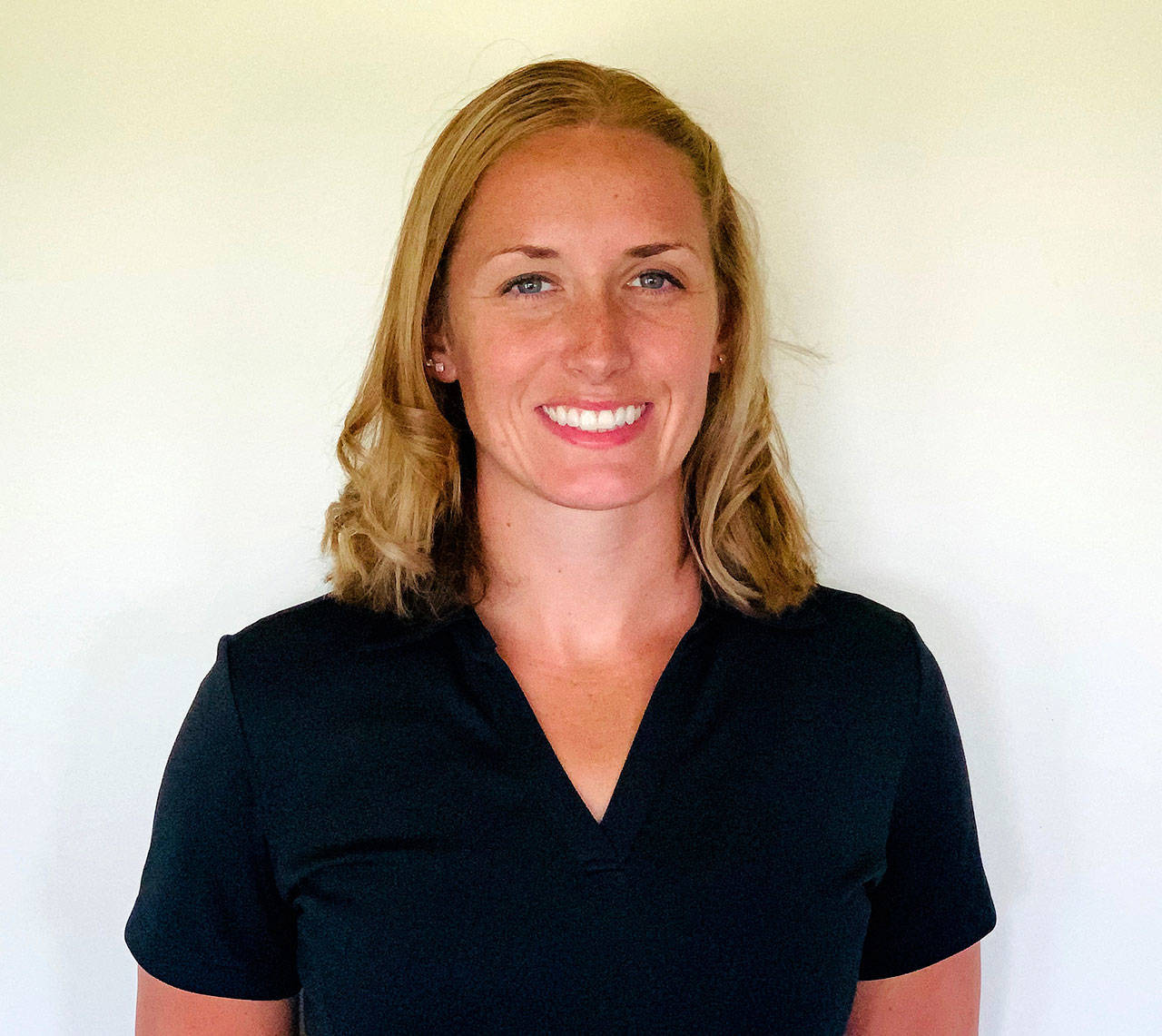 Sequim High School 2008 grad Sarah (Moores) Thorson is the Wolves’ new girls swim coach. Submitted photo