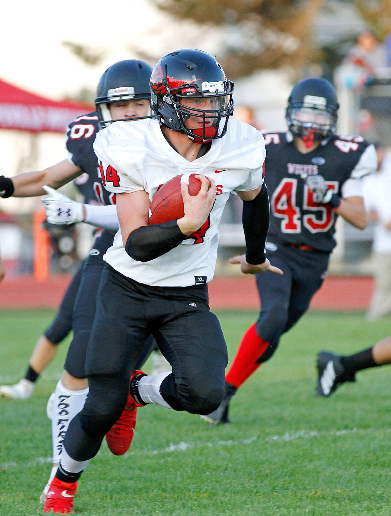 Port Townsend’s Dylan Tracer rumbled for 182 rushing yards and scored four touchdowns in the Redhawks’ 49-16 win over Coupeville on Friday.                                Lisa Jensen/photo