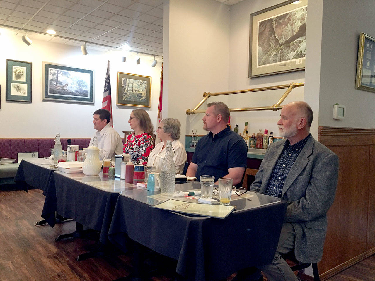 Olympic Medical Center commissioner candidates, from left, Nate Adkisson, Ann Marie Henninger, Jean Hordyk, Ted Bowen and Thom Hightower prepare to debate Tuesday at the Port Angeles Business Association’s breakfast meeting at Joshua’s Restaurant in Port Angeles. (Rob Ollikainen/Peninsula Daily News)